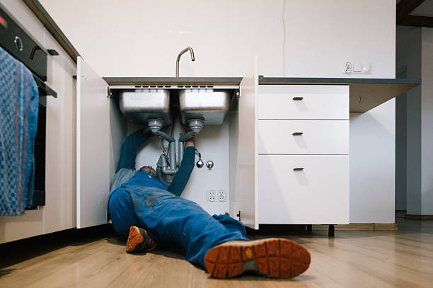 Professional Plumbing technician working in Sunman, IN